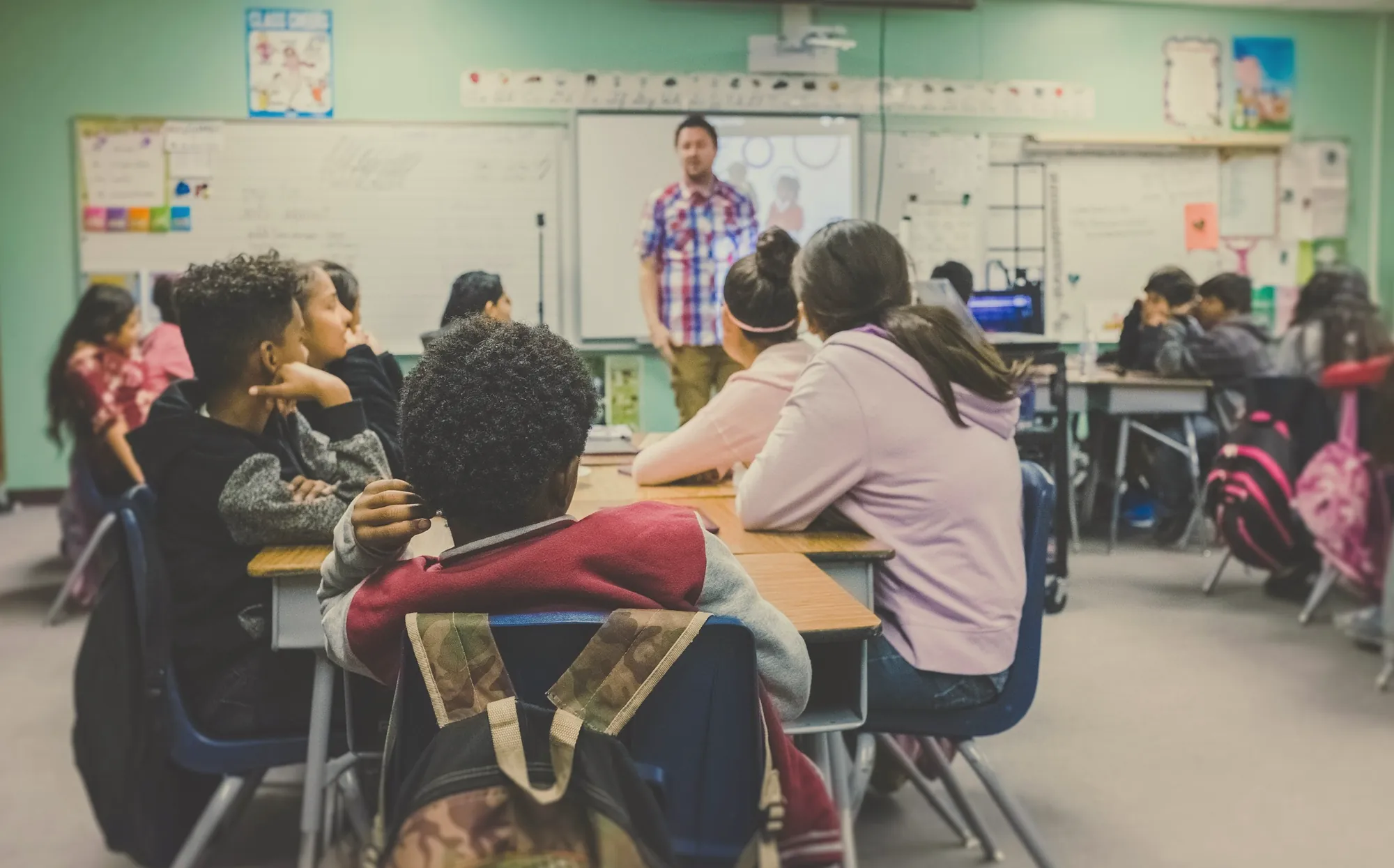 Students listening in a classroom